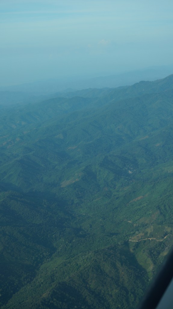 View from the plane window - it would have taken us a minimum of 6 hours to make this drive …..up up up, curve curve curve …. urch … donkey in road …..the occasional village …..