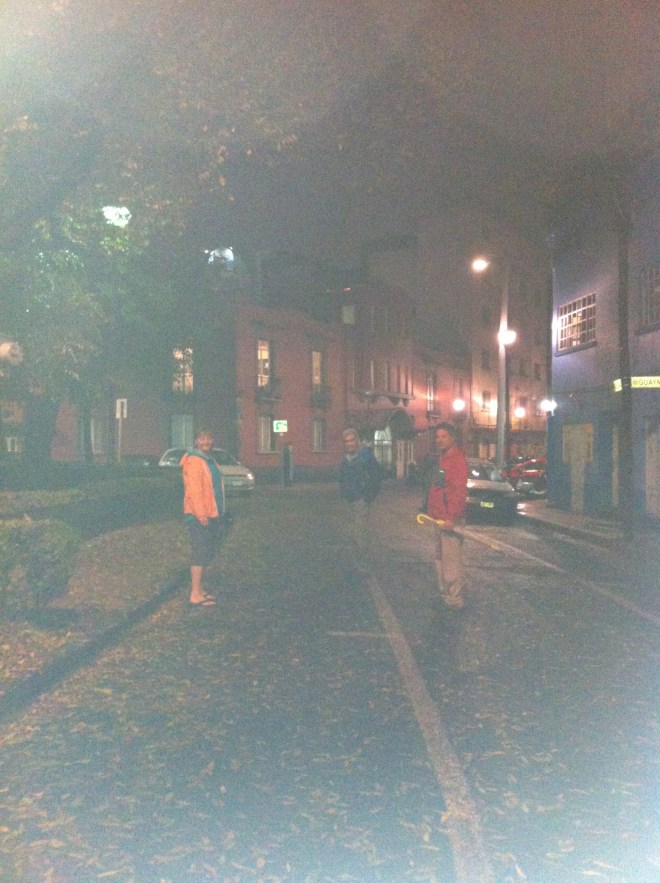 Poor quality photo - but these hardy individuals are braving the torrential rain with thunder crashing overhead to find a restaurant in Mexico City!