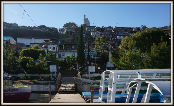 Arriving to Isla Janitzia, with the statue of Jose Maria Morelos y Pavon towering over the small island.  Now to hike up there ...