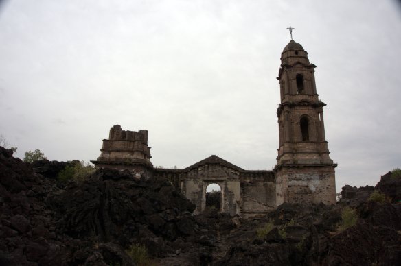 Lava rock all around the church, the lower levels completely submerged but this upper portion remained - with the altar intact inside