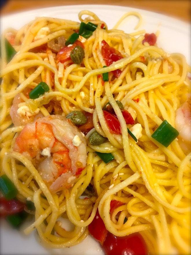 Plump juicy shrimp, fresh tomatoes and spring onions combine with capers for a quick easy dinner.