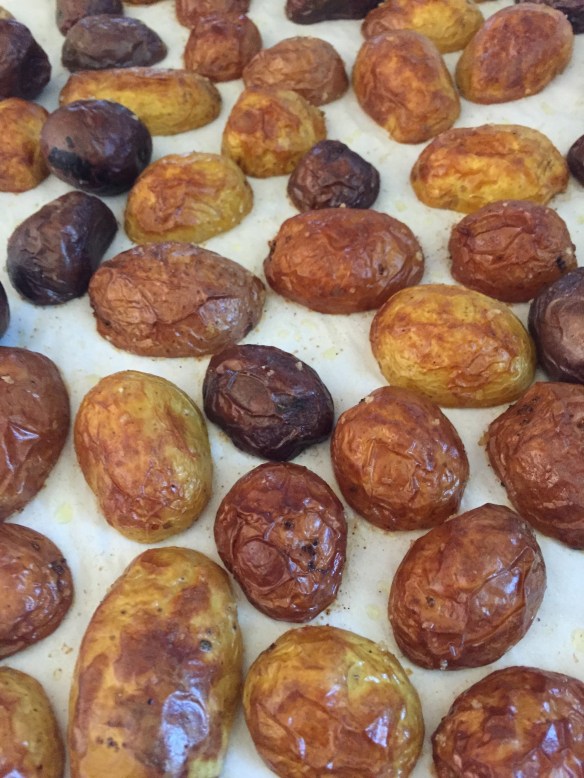 Roast potatoes with a little olive oil, salt and pepper until tender