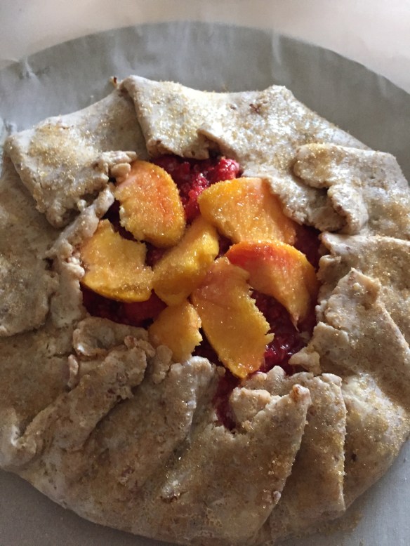 Ready for the oven, this raspberry peach galette looks delicious already.