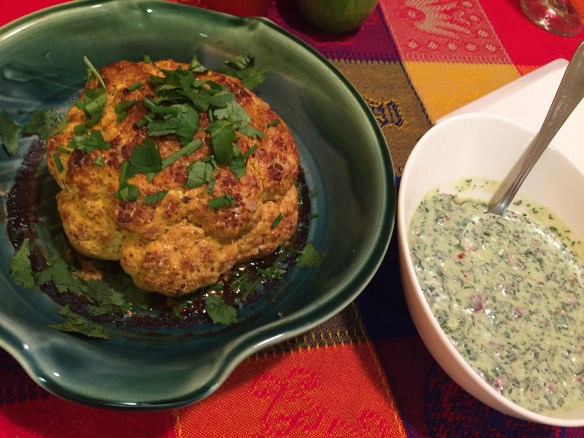 For an impressive presentation, roast the cauliflower whole with the cilantro & mint sauce to serve.  If you want the cauliflower to roast quicker, and really just want to get it on the table, simply cut cauliflower into florets and roast.  Florets may take about 20-30 minutes to roast depending on the size.  Only cook them long enough to be fork tender.